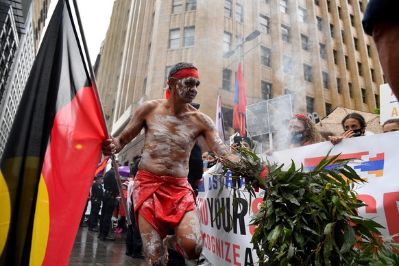 epa08769376 An Indigenous representative performs a Welcome to Country for protestors calling out the Australian government?s silence over the attacks on Armenia amid the ongoing Nagorno-Karabakh conf ...