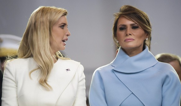 epa05736637 Ivanka Trump (L), President Trump&#039;s daughter, talks with First Lady Melania Trump (R) during the Inaugural Parade for President Donald J. Trump after he was sworn in as the 45th Presi ...