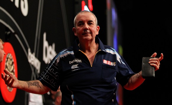LONDON, ENGLAND - MAY 22: Phil Taylor of England reacts during the McCoys Premier League Darts Play-Offs Semi Final match between Raymond van Barneveld and Phil Taylor at O2 Arena on May 22, 2014 in L ...