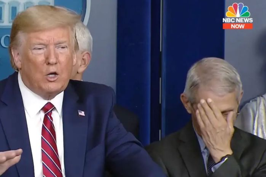 Dr. Anthony Fauci has a moment as President Trump speaks during a COVID-19 briefing at the White House on March 20, 2020. Photo: NBC News