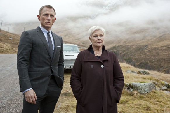 This film image released by Sony Pictures shows Daniel Craig as James Bond, left, and Judi Dench as MI6 head M, in a scene from the film &quot;Skyfall.&quot; Dench has been the Bond matriarch: the str ...