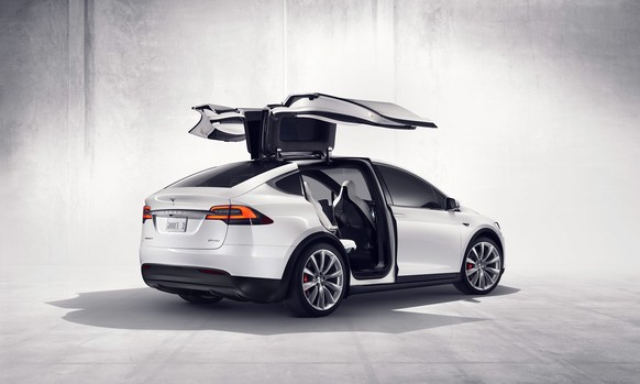 epa04957166 A undated handout picture made available by Tesla Motors 30 September 2015 showing the new Tesla X model. Electric car maker Tesla Motors launched its first sport-utility vehicle, the Mode ...