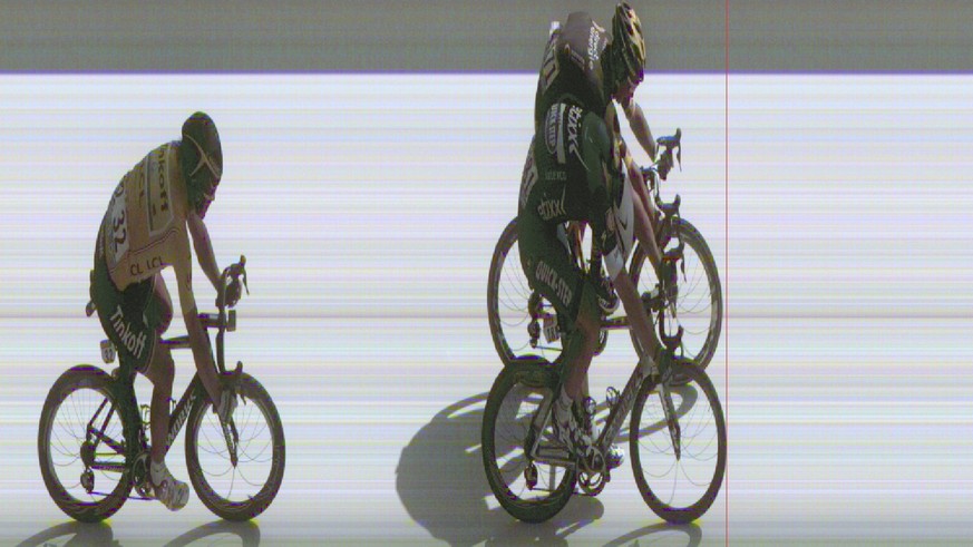 In this photo finish image released by A.S.O. Tuesday, July 5, 2016, Germany&#039;s sprinter Marcel Kittel, bottom right, pushes his bicycle over the finish line ahead of second placed Brian Coquard o ...