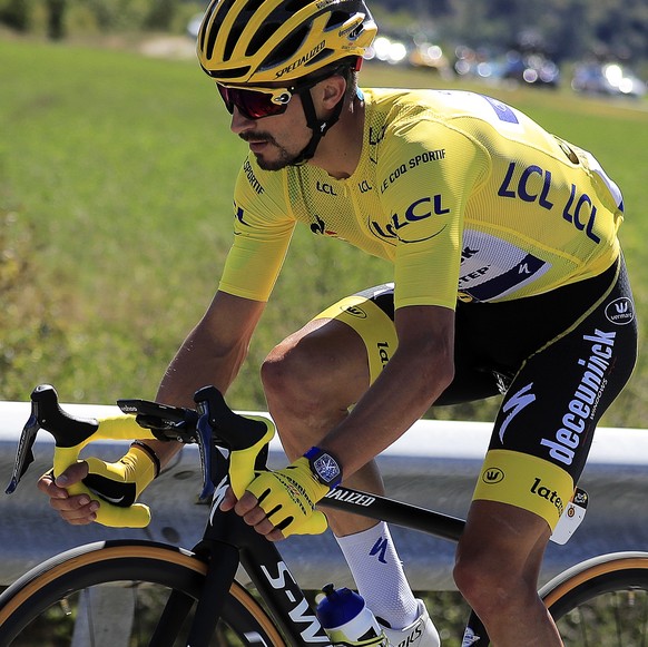 epa08639385 French rider Julian Alaphilippe of the Deceuninck Quick-Step team wears the overall leader&#039;s yellow jersey during the 4th stage of the 107th edition of the Tour de France cycling race ...