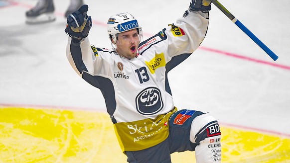 Ambri&#039;s player Marco Mueller celebrates the 0-3 goal, during the preliminary round game of National League A (NLA) Swiss Championship 2019/20 between HC Lugano and HC Ambri Piotta at the ice stad ...