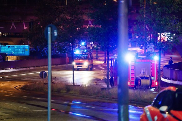 epa08611756 Firetrucks drive near a site where several accidents took place in Berlin, Germany, 18 August 2020. Media reports state, that a man, who was responsible for several accidents in a row on t ...
