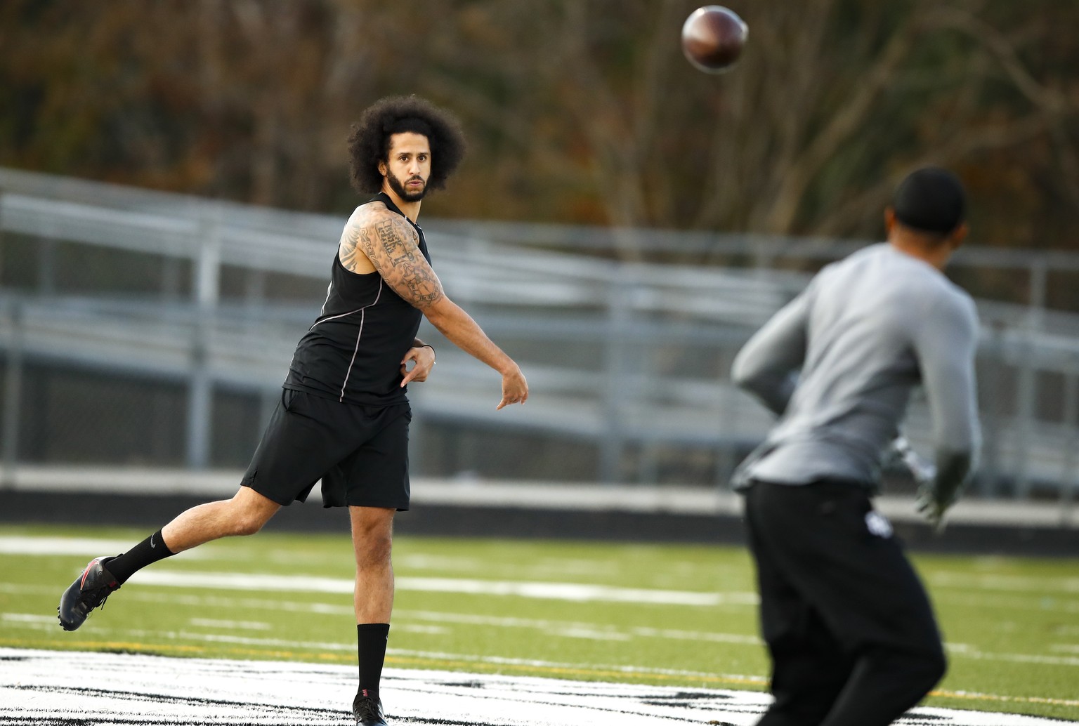 Free agent quarterback Colin Kaepernick participates in a workout for NFL football scouts and media, Saturday, Nov. 16, 2019, in Riverdale, Ga. (AP Photo/Todd Kirkland)