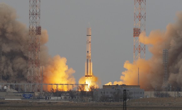 The Proton-M rocket booster blasts off at the Russian leased Baikonur cosmodrome, Kazakhstan, Monday, March 14, 2016. The Russian rocket carries an orbiter for measuring atmospheric gases of Mars and  ...