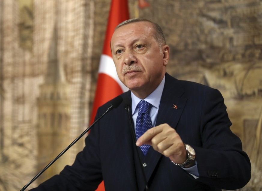 Turkey&#039;s President Recep Tayyip Erdogan speaks to his ruling party&#039;s lawmakers, in Istanbul, Saturday, Feb. 29, 2020. Erdogan said Saturday that his country&#039;s borders with Europe were o ...