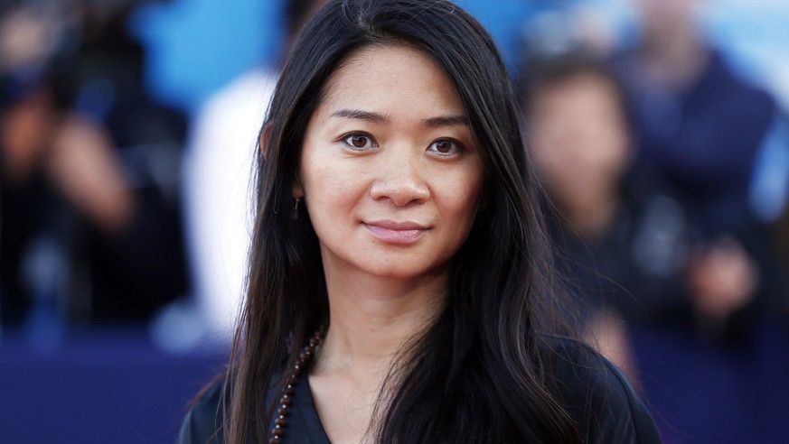 epa08984427 (FILE) - China-US film director Chloe Zhao arrives on the red carpet during 41st Deauville American Film Festival, in Deauville, France, 06 September 2015 (reissued 03 February 2021). Chlo ...
