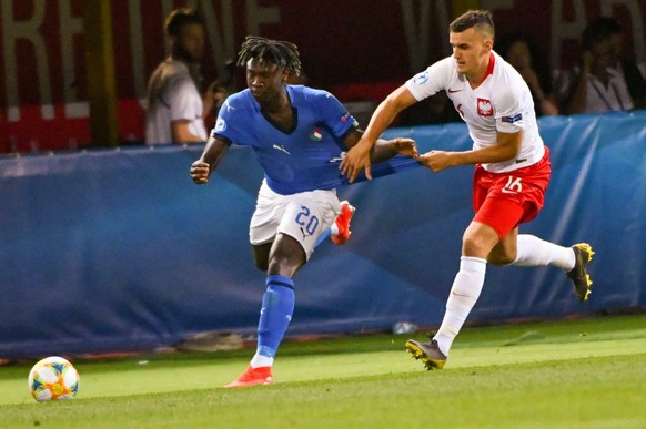Patryk Dziczek of Polska and Moise Kean of Italy in action during the Uefa European Under-21 Championship 2019 - Group A Match Between Italy And Poland in Bologna, Italy, Wednesday, June 2019. (Alessi ...