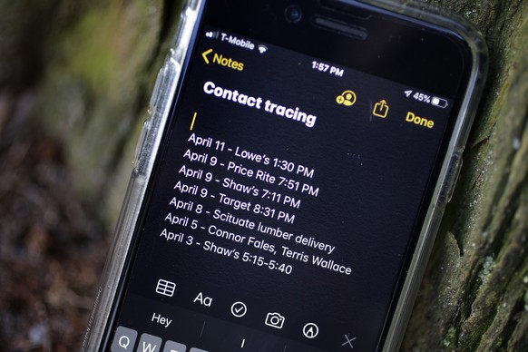 FILE - In this April 15, 2020, file photo, a smartphone belonging to Drew Grande, of Cranston, R.I., shows notes he made for contact tracing. Grande began keeping a log on his phone at the beginning o ...