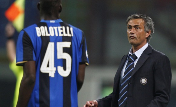 Inter Milan coach Jose&#039; Mourinho, of Portugal,right, gestures with Inter Milan forward Mario Balotelli after he scored against Siena at the San Siro stadium in Milan, Italy, Sunday, May 17 2009.  ...