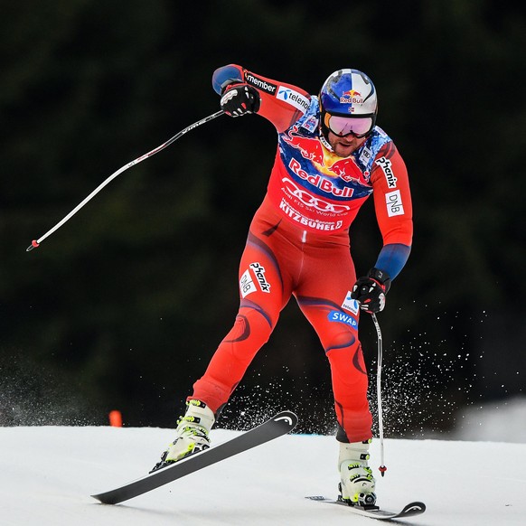 epa06443112 Aksel Lund Svindal of Norway takes a jump during the first training run for the Men&#039;s Downhill race of the FIS Alpine Skiing World Cup event in Kitzbuehel, Austria, 16 January 2018. E ...