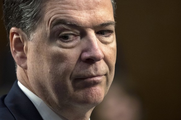 In this June 8, 2017 photo, former FBI director James Comey testifies before the Senate Select Committee on Intelligence, on Capitol Hill in Washington. The Republican attacks on fired FBI Director Ja ...