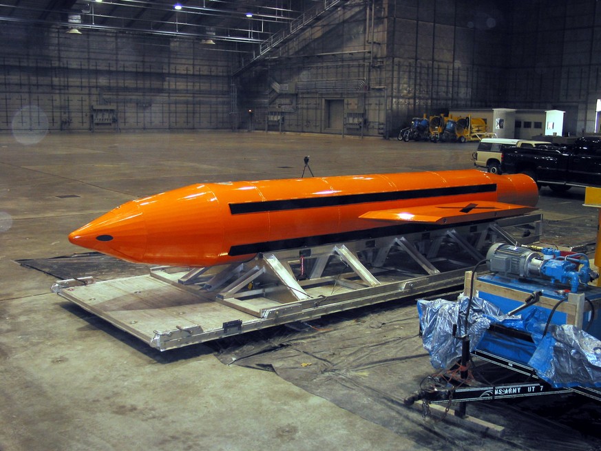 epa05906547 A handout photo made available by the US Department of Defense (DoD) shows a GBU-43 Massive Ordnance Air Blast (MOAB) bomb being prepared for testing at the Eglin Air Force Armament Center ...