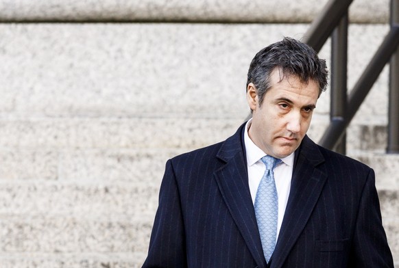 epa07197392 Michael Cohen, US President Donald Trump&#039;s former personal lawyer, leaves Federal District Court after pleading guilty to charges related to lying to congress in New York, New York, U ...