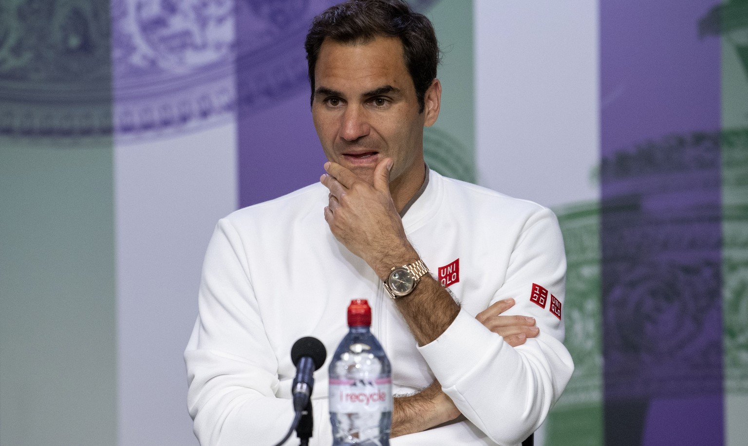 Switzerland&#039;s Roger Federer reacts during the press conference following his defeat by Serbia&#039;s Novak Djokovic in the men&#039;s singles final match of the Wimbledon Tennis Championships in  ...
