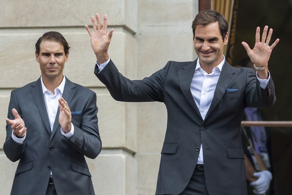 Team Europe&#039;s Rafael Nadal, left, and Roger Federer, right, greet the fans, during the official welcome ceremony together with other tennis players ahead of the Laver Cup in Geneva, Switzerland,  ...
