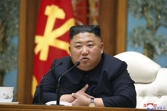 In this Saturday, April 11, 2020, photo provided by the North Korean government on Sunday, April 12, 2020, North Korean leader Kim Jong Un attends a politburo meeting of the ruling Workers&#039; Party ...