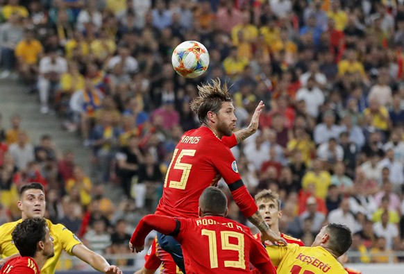 Spain&#039;s Sergio Ramos jumps for a header during the Euro 2020 group F qualifying soccer match between Romania and Spain, at the National Arena stadium in Bucharest, Romania, Thursday, Sept. 5, 201 ...