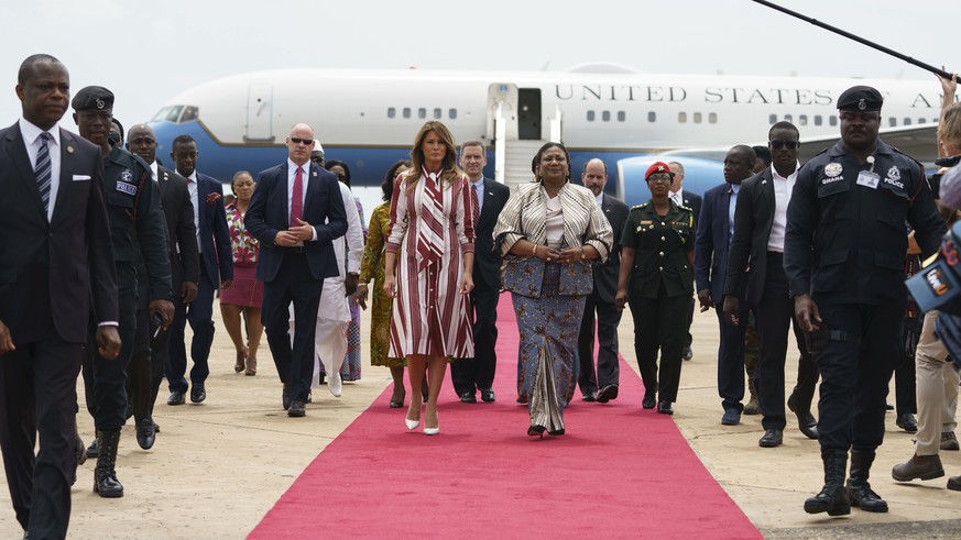 First lady Melania Trump walks with Ghana&#039;s first lady Rebecca Akufo-Addo as she arrives at Kotoka International Airport in Accra, Ghana, Tuesday, Oct. 2, 2018. First lady Melania Trump is visiti ...