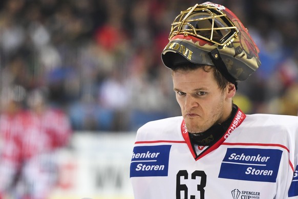 Swiss goalkeeper Leonardo Genoni reacts during the final game between Team Canada and Team Suisse at the 91st Spengler Cup ice hockey tournament in Davos, Switzerland, Sunday, Dec. 31, 2017. (Gian Ehr ...