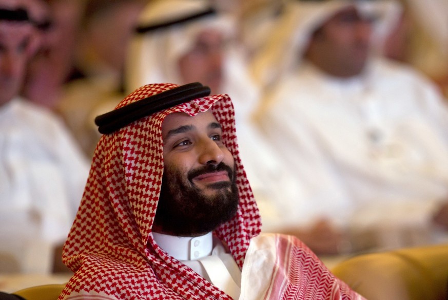 FILE- In this Oct. 23, 2018 file photo, Saudi Crown Prince, Mohammed bin Salman, smiles as he attends the Future Investment Initiative conference, in Riyadh, Saudi Arabia. The killing of Washington Po ...