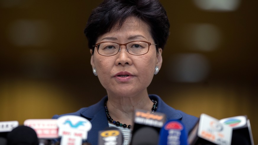 epa07638248 Hong Kong Chief Executive Carrie Lam speaks at a press conference in Hong Kong, China, 10 June 2019. Lam said she will not withdraw the controversial extradition bill or resign as chief ex ...