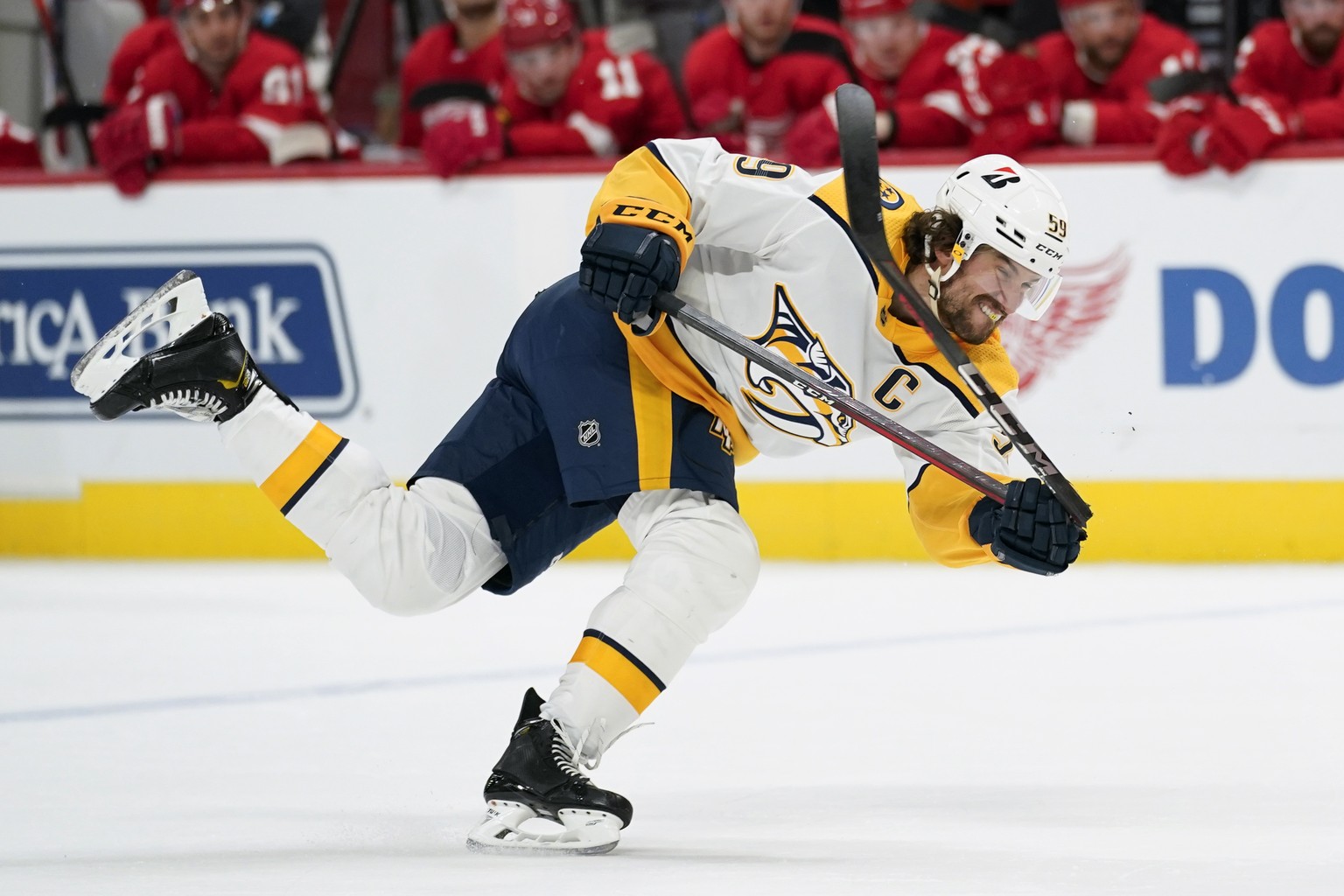 Nashville Predators defenseman Roman Josi breaks his stick on a shot against the Detroit Red Wings in the first period of an NHL hockey game Tuesday, Feb. 23, 2021, in Detroit. (AP Photo/Paul Sancya)