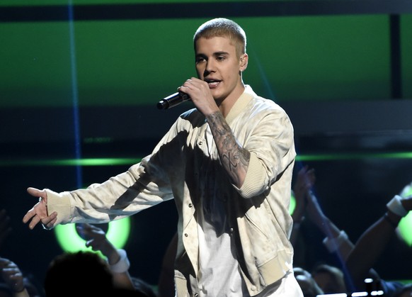 FILE - In this May 22, 2016 file photo, Justin Bieber performs at the Billboard Music Awards in Las Vegas. Bieber walked off the stage during his show in Manchester, England, Sunday after some fans ig ...
