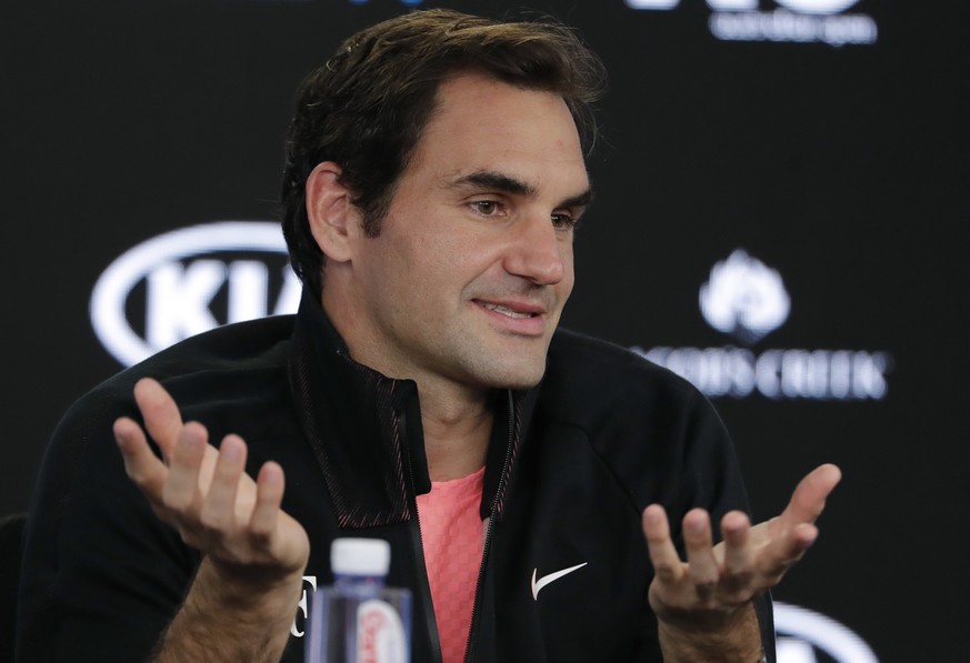 Switzerland&#039;s Roger Federer gestures during a press conference following his semifinal win over South Korea&#039;s Hyeon Chung when he retired injured at the Australian Open tennis championships  ...