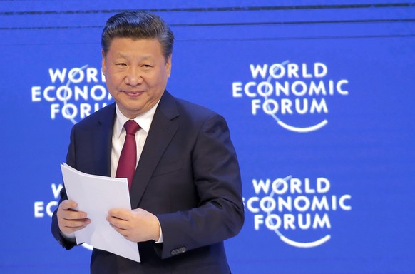 FILE - In this Jan. 17, 2017, file photo, China&#039;s President Xi Jinping smiles to the audience after his speech at the World Economic Forum in Davos, Switzerland. Economic concerns remain foremost ...