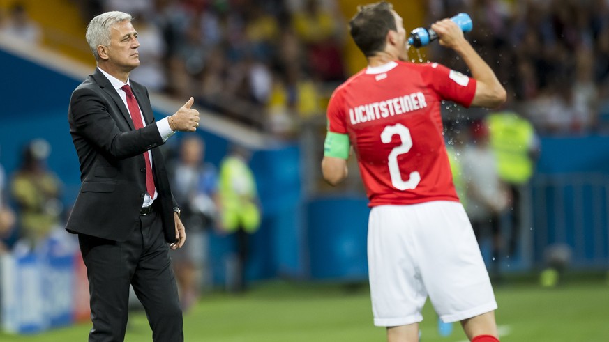 Switzerland&#039;s head coach Vladimir Petkovic, left, reacts next to Switzerland&#039;s defender Stephan Lichtsteiner, right, during the FIFA soccer World Cup 2018 group E match between Switzerland a ...