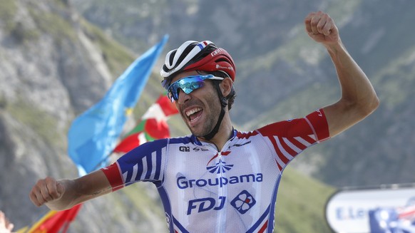 France&#039;s Thibaut Pinot celebrates as he crosses the finish line to win the fourteenth stage of the Tour de France cycling race over 117.5 kilometers (73 miles) with start in Tarbes and finish at  ...