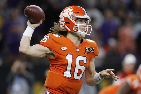 Clemson quarterback Trevor Lawrence passes against LSU during the second half of a NCAA College Football Playoff national championship game Monday, Jan. 13, 2020, in New Orleans. (AP Photo/Gerald Herb ...