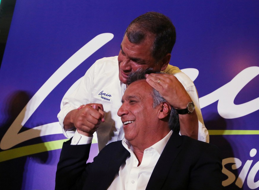 Ecuador&#039;s President Rafael Correa (top) hugs Lenin Moreno, candidate of the ruling PAIS Alliance Party, at the Hotel Colon during the presidential election in Quito, Ecuador February 19, 2017. RE ...