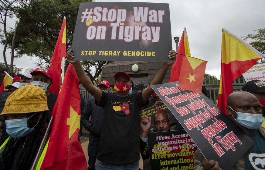 Members of the Tigrayan-Ethiopian community protest against the conflict in the Ethiopia&#039;s Tigray region, outside the European Union offices in Pretoria, South Africa, Thursday, March 25, 2021. ( ...