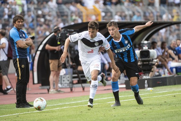 Olivier Custodio Lugano&#039;s Player and Sebastiano Esposito Inter&#039;s Player, from left, during a friendly soccer match between Switzerland&#039;s FC Lugano and Italy&#039;s Inter Milan, on Sunda ...