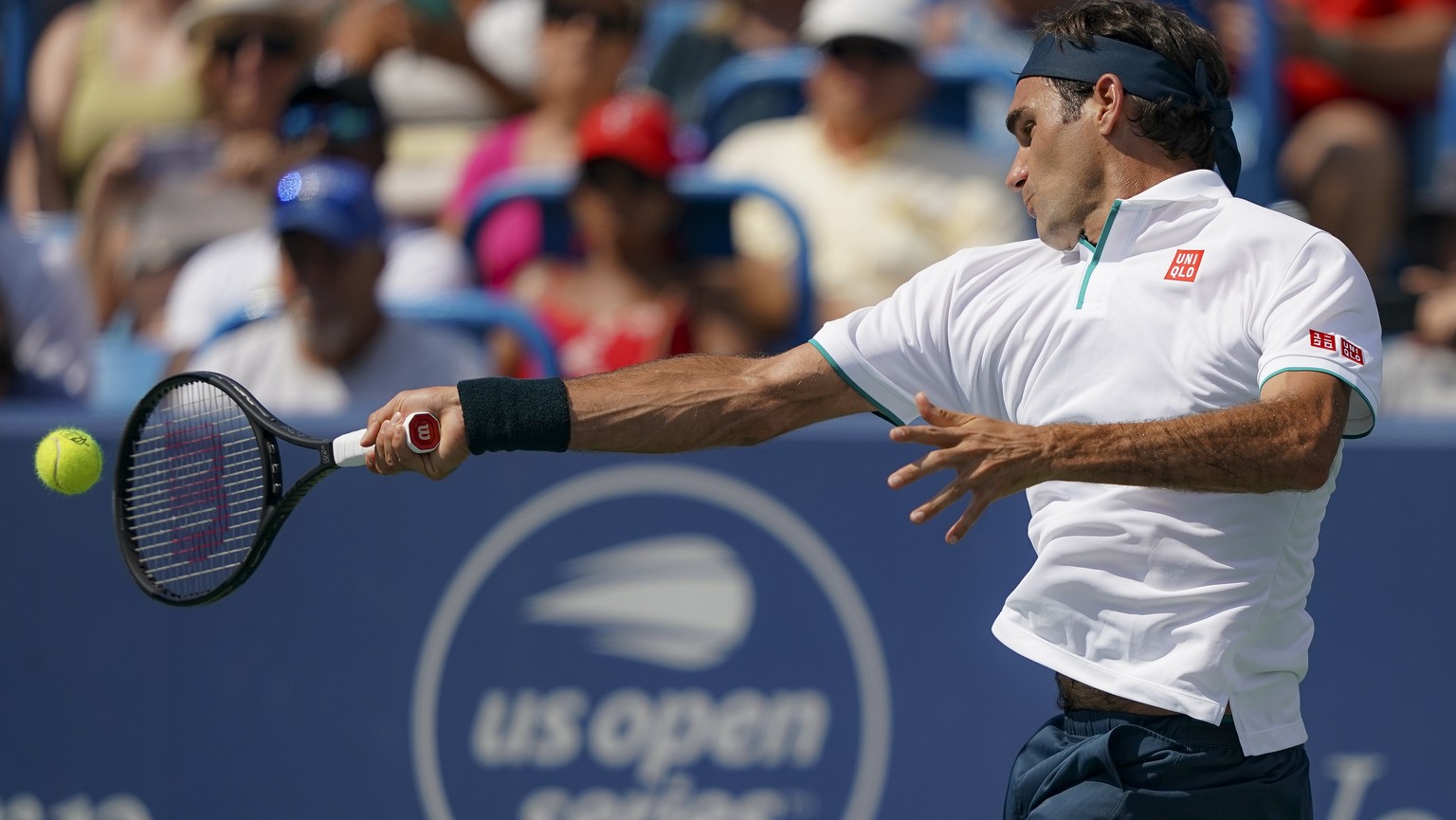 Roger Federer, of Switzerland, returns to Andrey Rublev, of Russa, during the quarterfinals of the Western &amp; Southern Open tennis tournament, Thursday, Aug. 15, 2019, in Mason, Ohio. (AP Photo/Joh ...