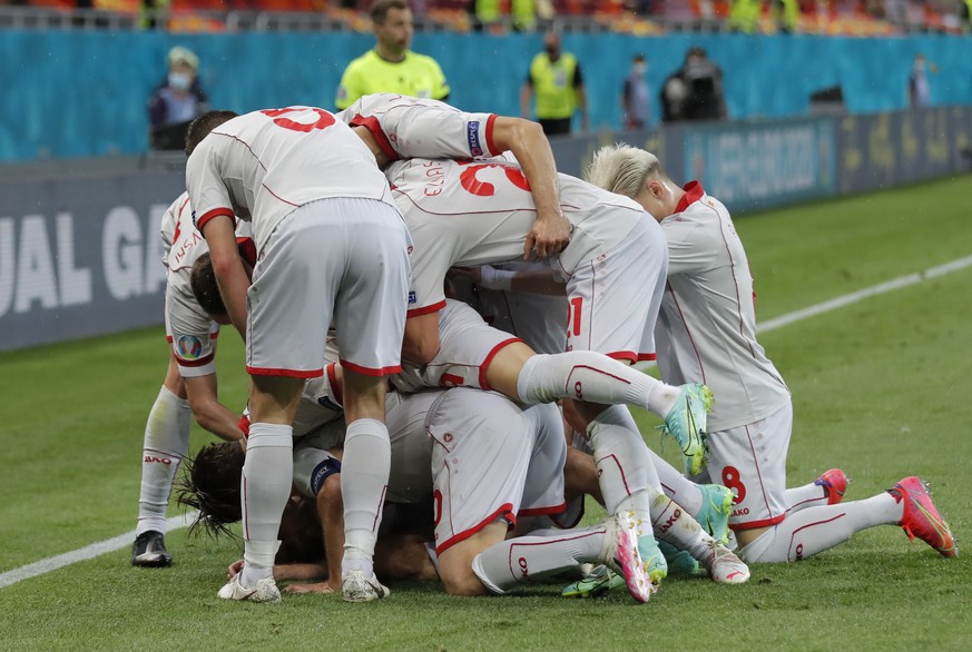 North Macedonia&#039;s Goran Pandev celebrates with teammates after scoring his side&#039;s opening goal during the Euro 2020 soccer championship group C match between Austria and Northern Macedonia a ...
