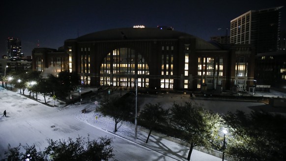 In order to save electricity, the promenade lights and screens are turned off in front of American Airlines Center which was to host the Nashville Predators and the Dallas Stars NHL hockey game, Monda ...