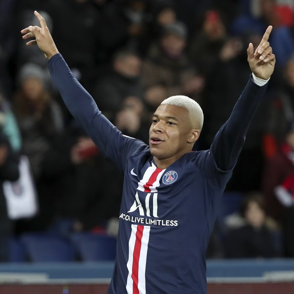 PSG&#039;s Kylian Mbappe celebrates after scoring his side&#039;s third goal during the League One soccer match between Paris Saint Germain and Amiens, at the Parc des Princes stadium in Paris, Saturd ...