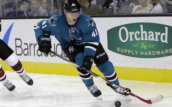 San Jose Sharks&#039; Mirco Mueller (41) is chased by Arizona Coyotes&#039; Joe Vitale (14) during the second period of an NHL preseason hockey game Friday, Sept. 25, 2015, in San Jose, Calif. (AP Pho ...