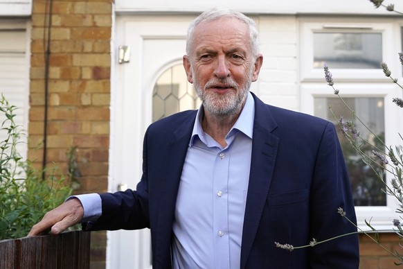 epa07796753 Leader of the British Labour Party Jeremy Corbyn leaves his home in central London, Britain, 27 August 2019. Mr Corbyn is due to host cross party talks later in the day to discuss plans to ...
