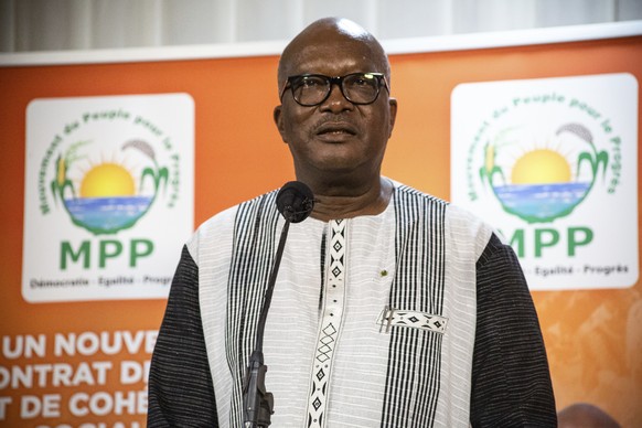 President Roch Marc Christian Kabore addresses supporters in Ouagadougou after learning he will serve another five years as Burkina Faso&#039;s president, according to provisional results announced by ...