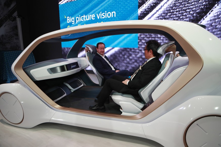 FILE- In a file photo from Jan. 16, 2018, seat maker Adient displays seating for autonomous vehicles at the North American International Auto Show in Detroit. In the U.S., electric vehicles only amoun ...