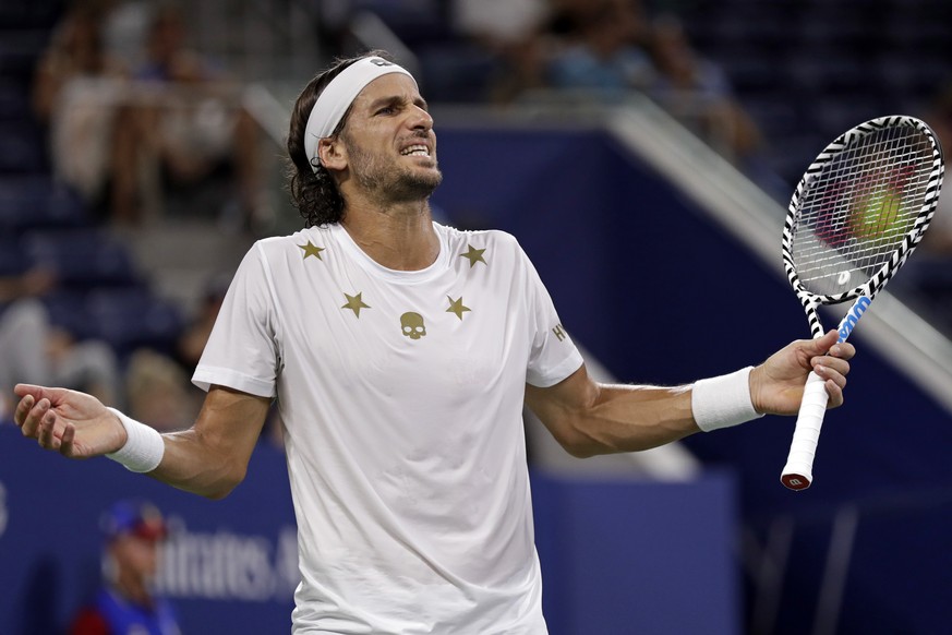 Feliciano Lopez, of Spain, reacts after losing a point against Daniil Medvedev, of Russia, during the third round of the U.S. Open tennis tournament Friday, Aug. 30, 2019, in New York. (AP Photo/Adam  ...