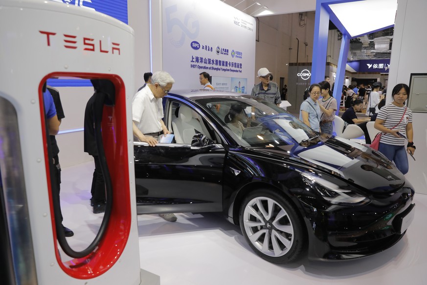 epa07942383 (FILE) - A Tesla model 3 automobile on display at the World Artificial Intelligence Conference (WAIC) in Shanghai, China, 30 August 2019 (reissued 23 October 2019). Tesla is to publish the ...