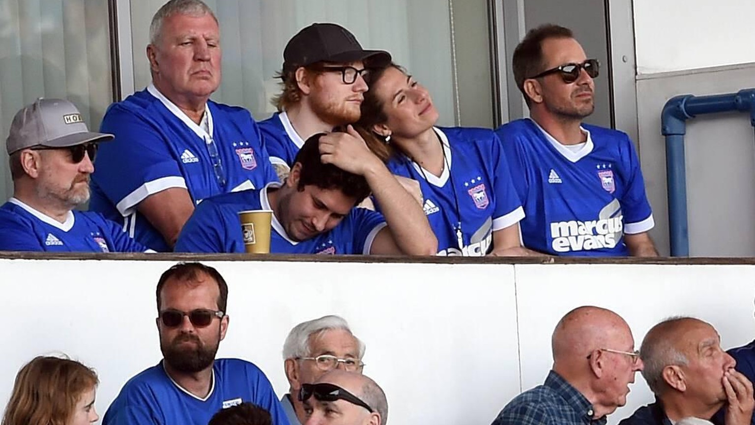 Ipswich Town v Aston Villa - Sky Bet Championship - Portman Road Ipswich Town fan Ed Sheeran (top row third right) and Cherry Seaborn in the stands watching the match EDITORIAL USE ONLY No use with un ...
